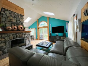 Smart TV, fireplace, DVD player, books