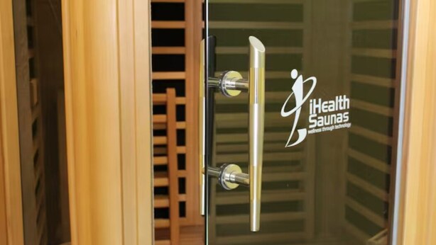 A glass door with a logo for iHealth Saunas and a metallic handle. - Large Cottage - Heart of Olinda - Old Police station (Olinda)