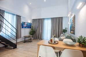 Comfort Apartment, 1 Queen Bed with Sofa bed, Sea View | Living area | Flat-screen TV
