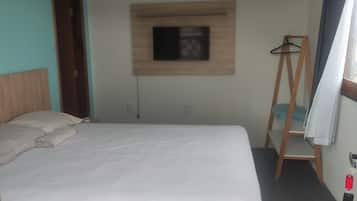 Quarto casal conforto de uso individual | Edredons de pluma, frigobar, individualmente mobiliados