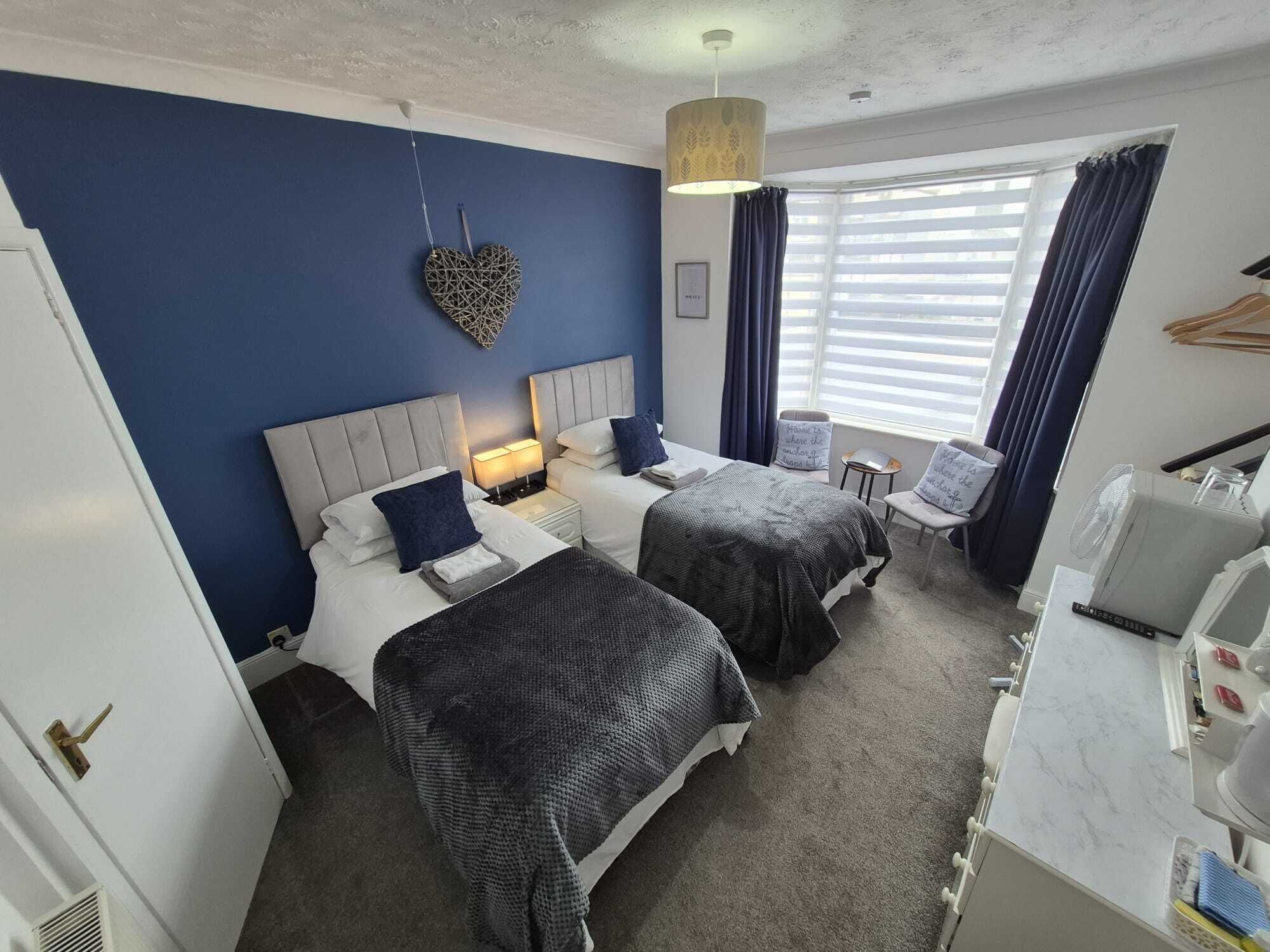 Deluxe Double or Twin Room | Blackout drapes, bed sheets
