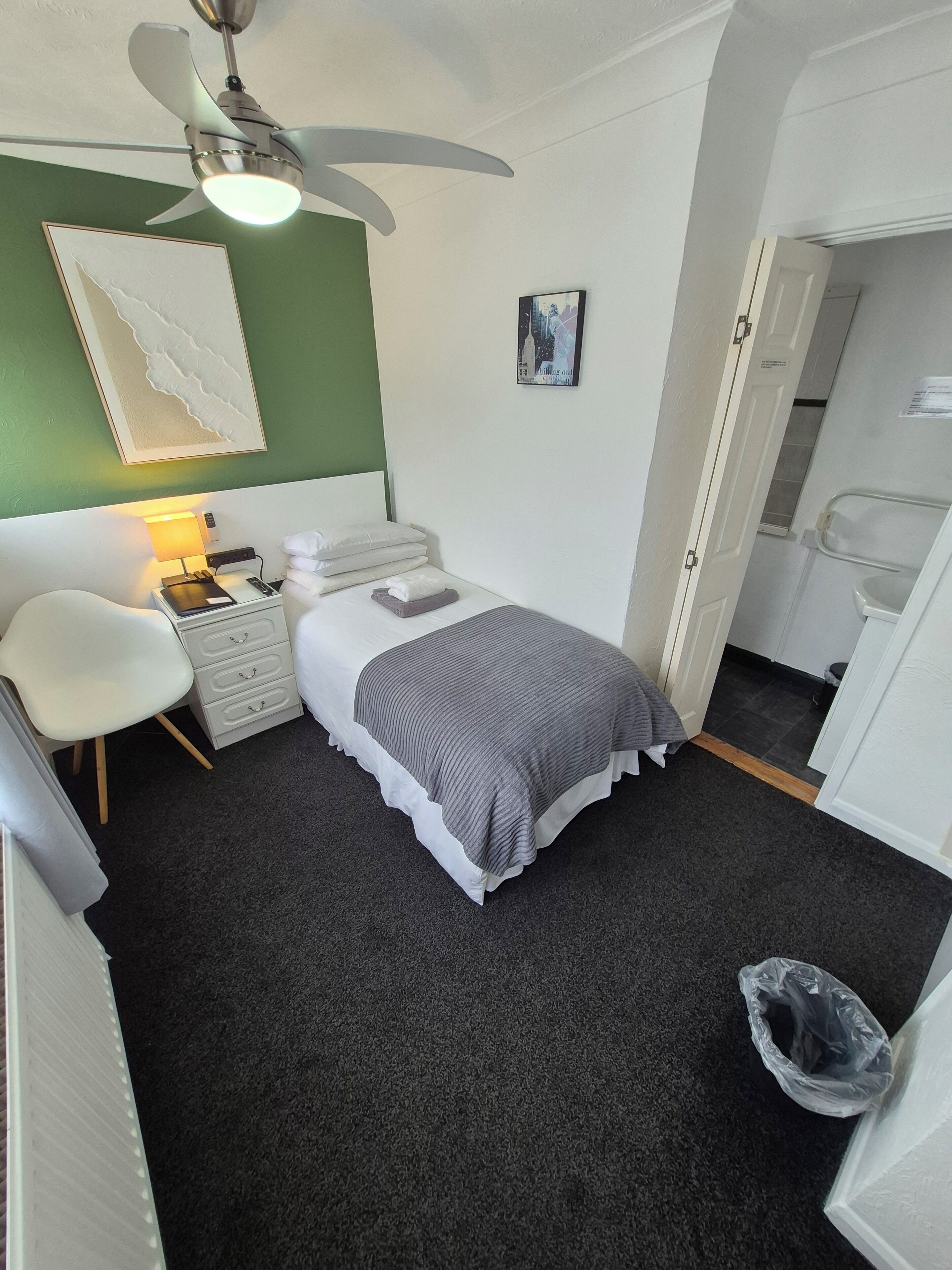 Deluxe Single Room (Room 9) | Blackout drapes, bed sheets