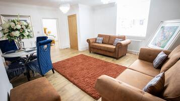 Apartment | Living area | 50-inch Smart TV with digital channels, TV, DVD player