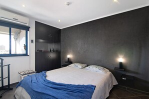 1 chambre, fer et planche à repasser, Wi-Fi gratuit, draps fournis