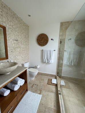 Shower, hair dryer, towels, soap