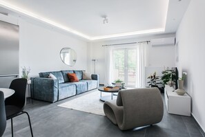 Standard Apartment | Living area | 43-inch Smart TV with digital channels, TV, Netflix