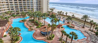 Ocean-view studio with well-equipped kitchen, W/D, pool, hot tub, & gym