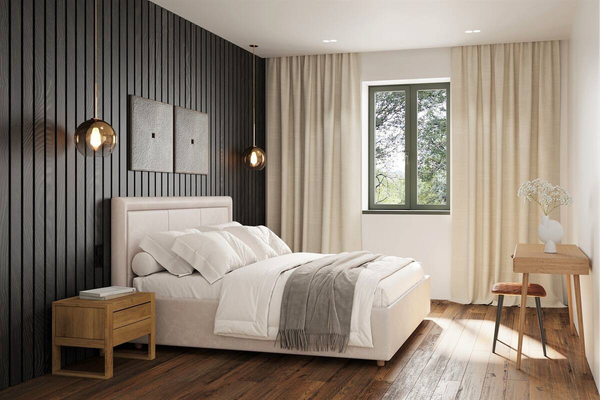 A modern bedroom with a bed, bedside table, and a window with curtains.