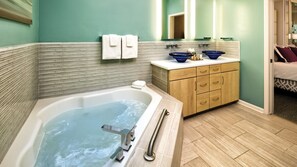 Shower, jetted bath, hair dryer, towels