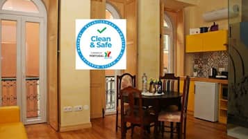 Sun Terrace | Living area | 40-inch flat-screen TV with cable channels, TV, Netflix