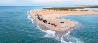 Canalfront Hatteras Condo w/ Private Balcony, Resort Pool, Boat Slips, Elevator