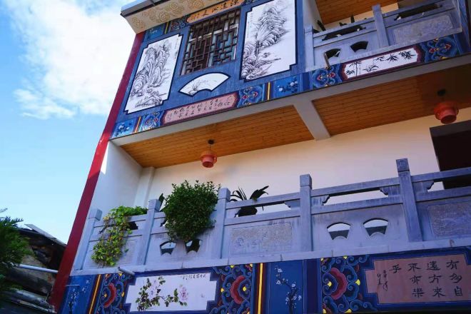 A multi-story building with traditional architectural elements, including ornate decorations and signage.