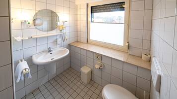 Economy Single Room | Bathroom | Shower, hair dryer, towels, soap