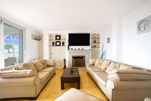 Smart TV, fireplace, video games, foosball