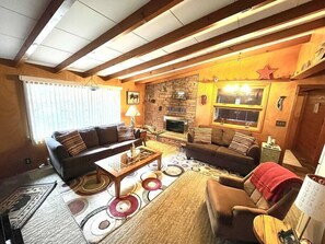 Flat-screen TV, fireplace, DVD player