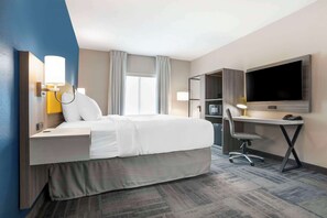 Suite, 1 King Bed, Accessible, Non Smoking | Desk, laptop workspace, blackout curtains, iron/ironing board