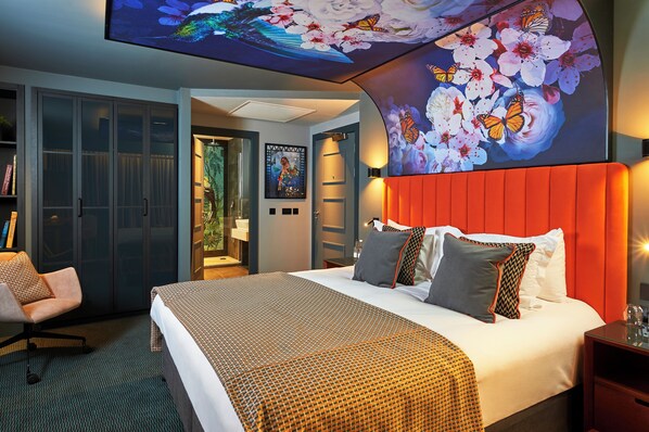 A hotel room with a large bed, a desk, a chair, a wardrobe, and a ceiling mural. - Malmaison Manchester Deansgate  (Manchester)