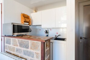 Réfrigérateur, lave-vaisselle, grille-pain