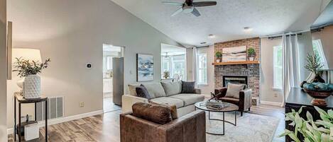 TV, fireplace, books, offices