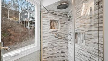Bathtub, hair dryer, towels