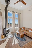 Deluxe Cabin | Living area | Fireplace