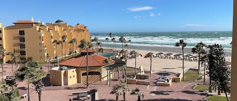 On the beach, sun loungers, beach towels