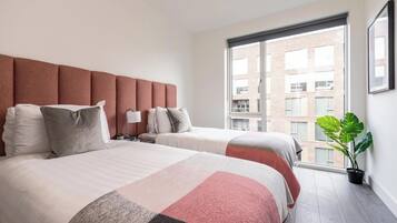 Apartment, 2 Bedrooms, Private Bathroom | Desk, laptop workspace, iron/ironing board, free WiFi
