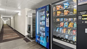A hallway with vending machines offering snacks and beverages. - Red Roof Inn PLUS+ Belleville (Belleville)