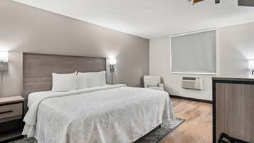 Deluxe Room, 1 King Bed (Smoke Free) | Blackout drapes, free WiFi, bed sheets