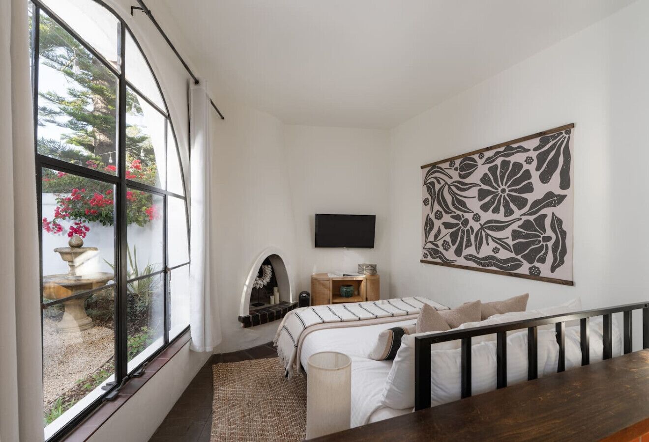 1 bedroom, desk, iron/ironing board, travel crib