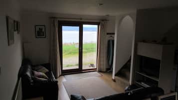 Casa de campo família, banheiro privativo, vista para o mar | Lounge