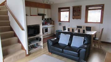 Chaumière familiale, salle de bain privée, vue sur la mer | Bar-salon