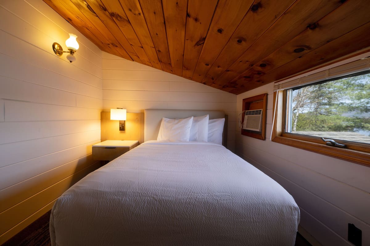 Lakeview Townhouse with Private Deck | Hypo-allergenic bedding, individually decorated, individually furnished