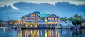 The Fish House In Historic Port Salerno - RV & Boat Trailer Parking Available!