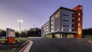 A modern hotel building with a flat roof, multiple windows, and a sign indicating it is the Avid Hotel. - Avid Hotel Staunton (Staunton)