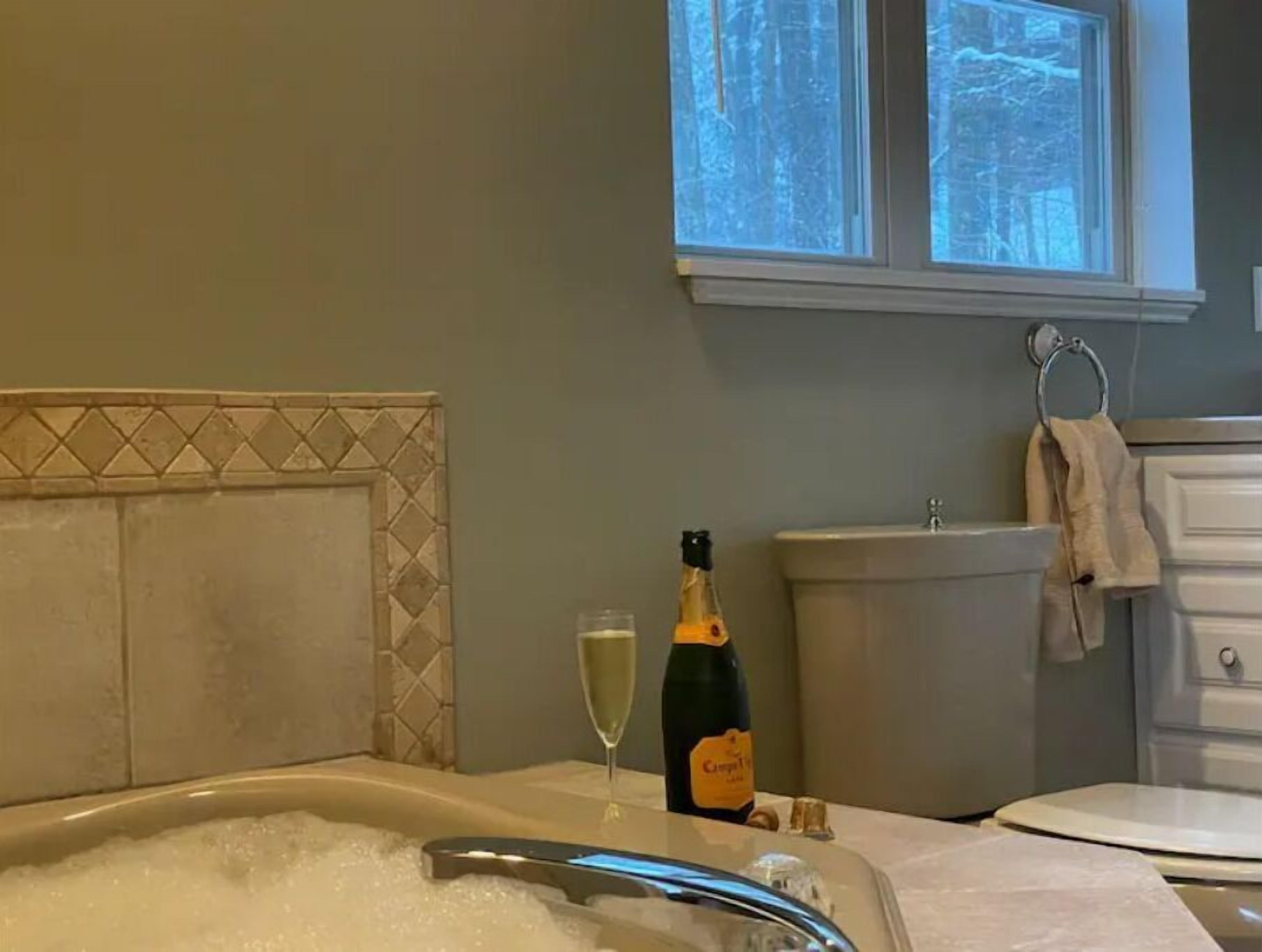 Shower, hair dryer, towels, toilet paper