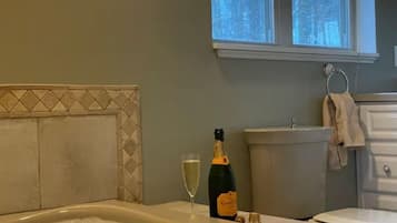 Shower, hair dryer, towels, toilet paper