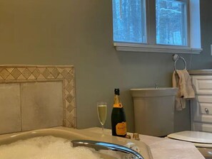 Shower, hair dryer, towels, toilet paper