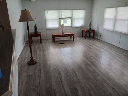 Beautiful modular home in scenic river complex.