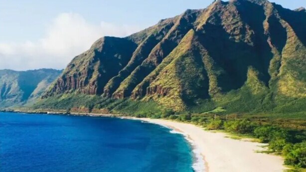 A coastal landscape with a beach and mountains. - Family Friendly 3BR w/Mt views, Close to Beach (Waianae)