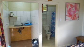 Economy Double Room, Partial Ocean View | Living area
