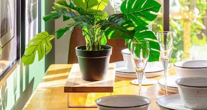 2-Bed Oasis with a King Bed and Green Accents