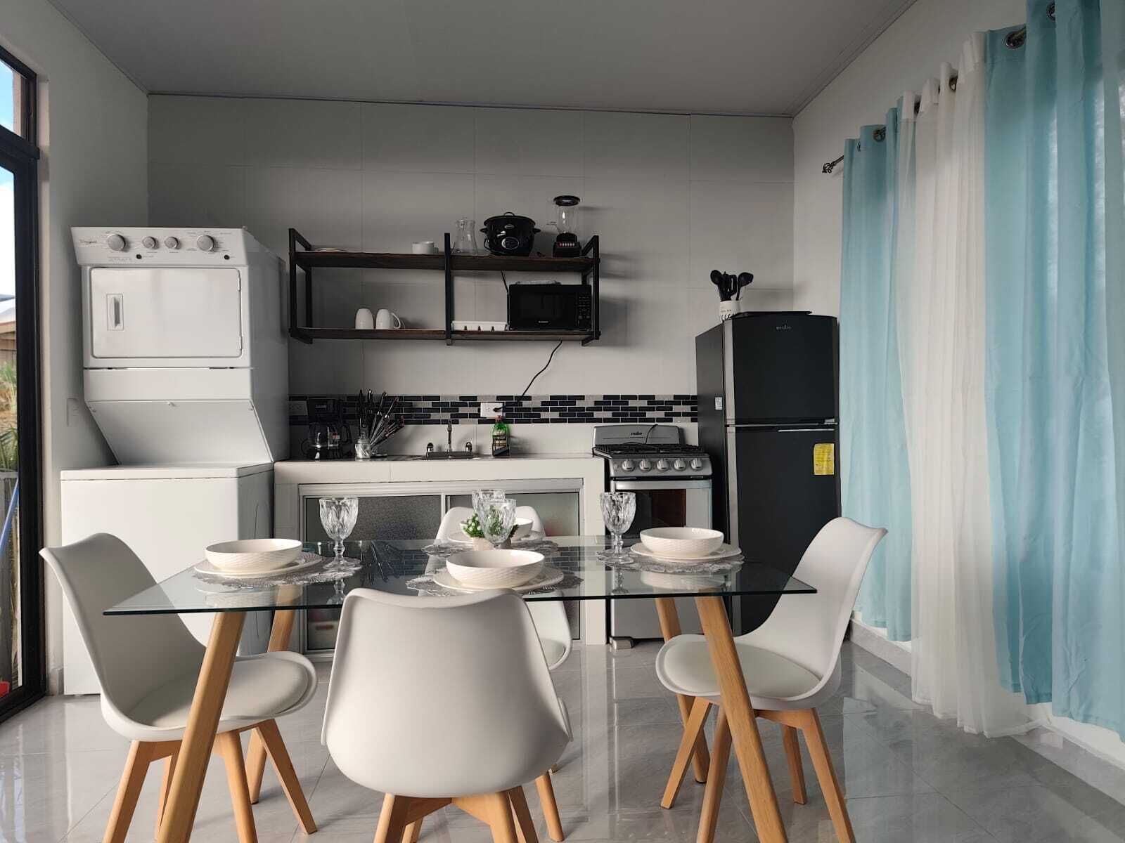 Microwave, oven, coffee/tea maker, cookware/dishes/utensils