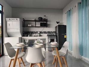 Microwave, oven, coffee/tea maker, cookware/dishes/utensils