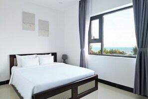 Standaard tweepersoonskamer, uitzicht op het strand | Donsdekens, Select Comfort-bedden, een minibar, individueel gedecoreerd