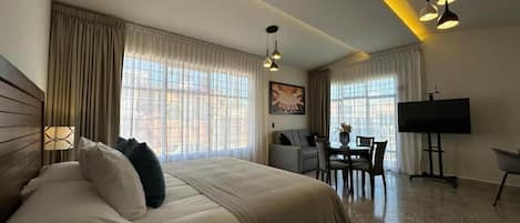 Executive-Doppelzimmer, Gartenblick | Bettwäsche aus ägyptischer Baumwolle, hochwertige Bettwaren