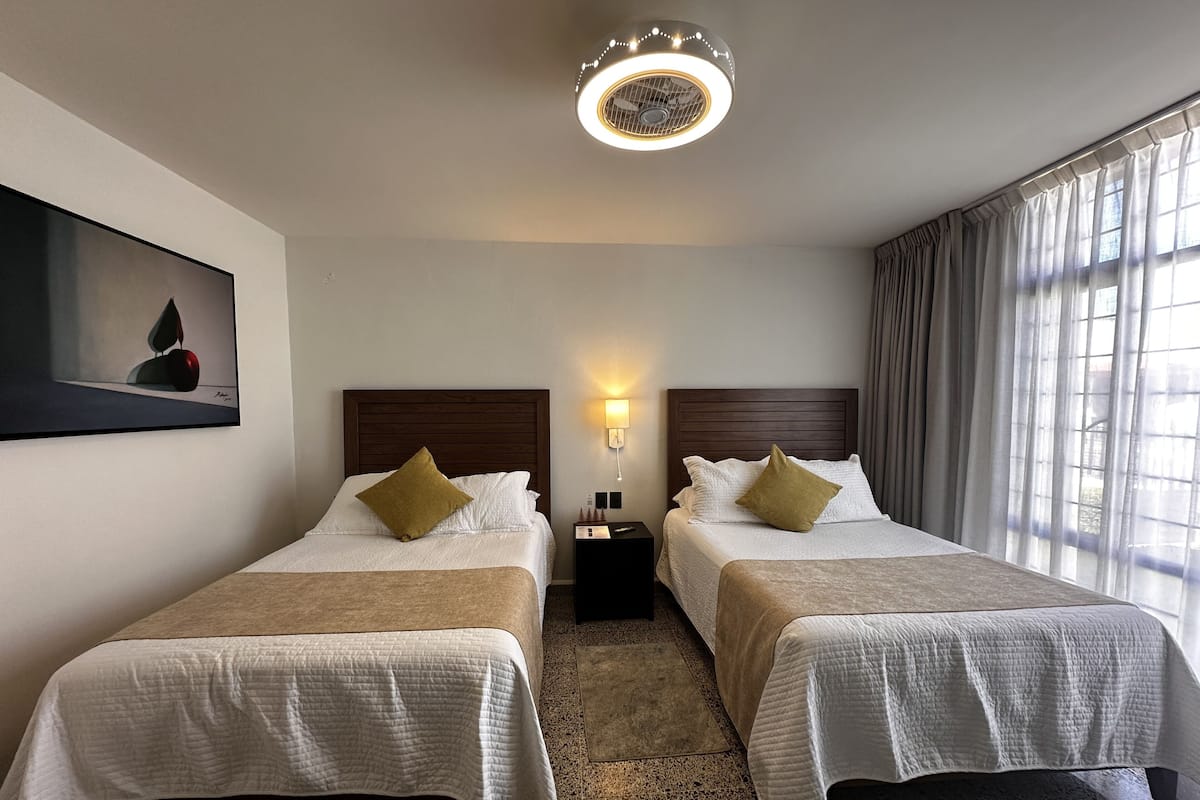 Habitación superior | Sábanas de algodón egipcio y ropa de cama de alta calidad