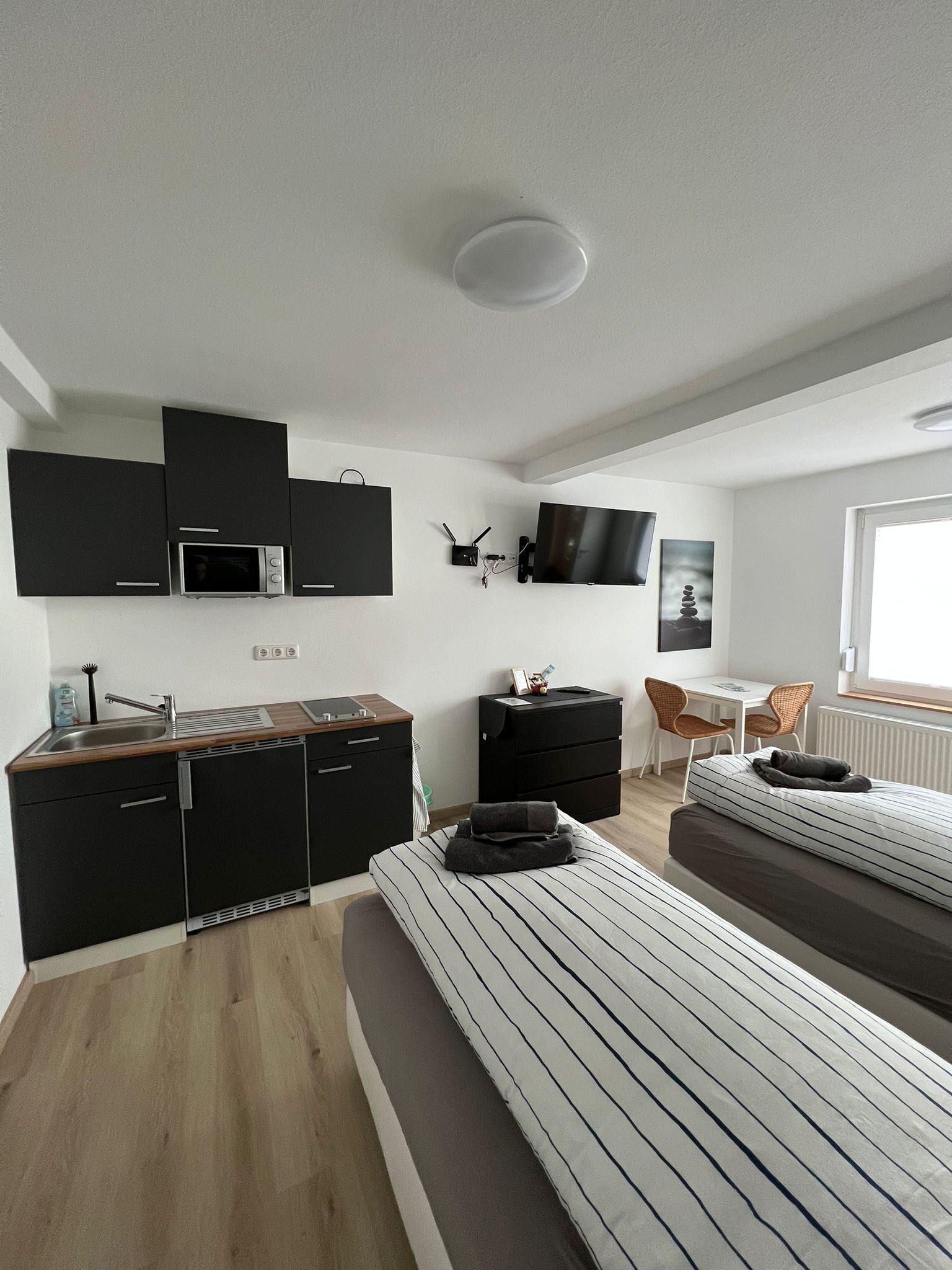 Ap­par­te­ment unteres Banfetal-Schlaf-/Wohnraum