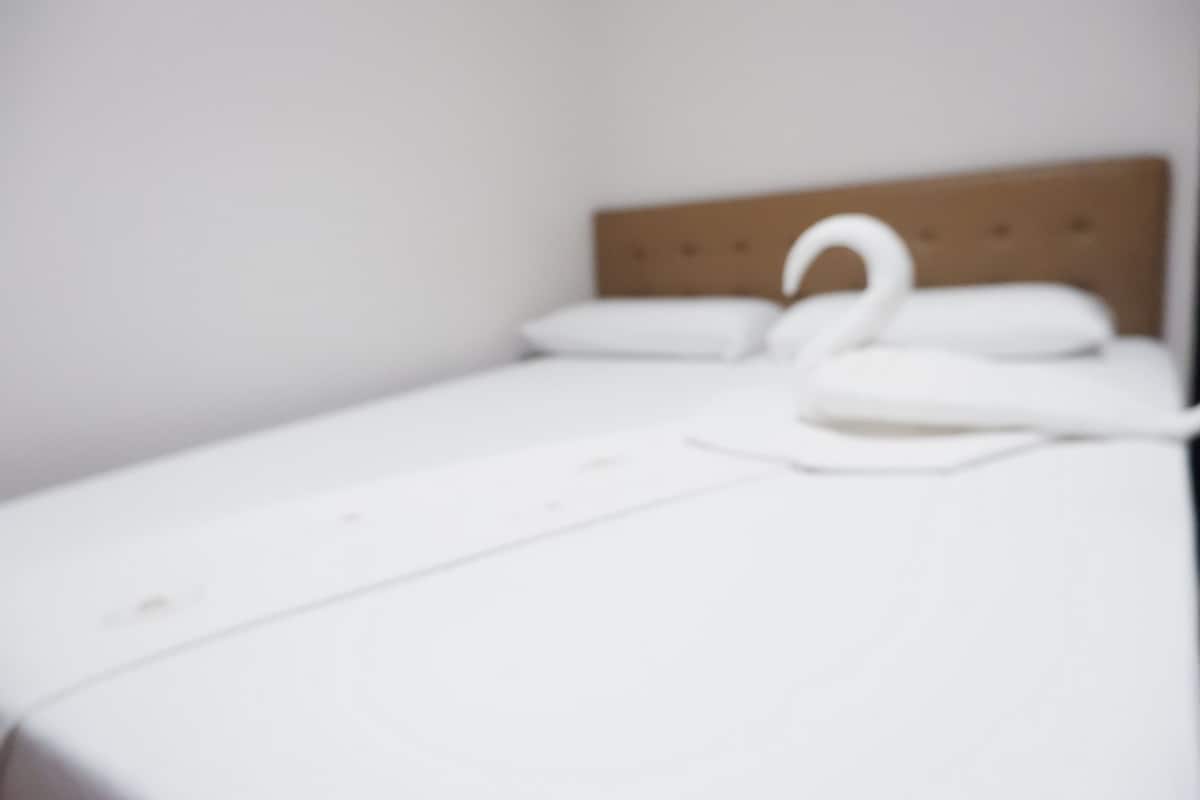 Hypo-allergenic bedding, blackout curtains, soundproofing, free WiFi