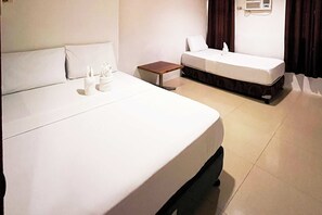 Family Room | Blackout curtains, soundproofing, rollaway beds, free WiFi - FB Budgetel Suites (Cagayan de Oro)